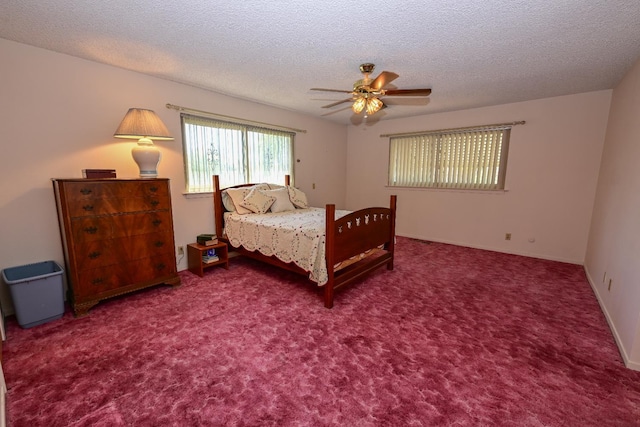 1911 W Simpson Ave, Fresno, CA 93705 - carpeted bedroom with a textured ceiling and a ceiling fan