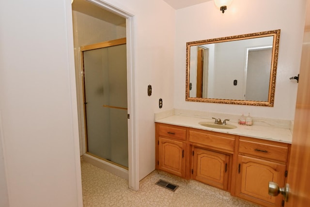 1911 W Simpson Ave, Fresno, CA 93705 - bathroom featuring vanity and a shower stall