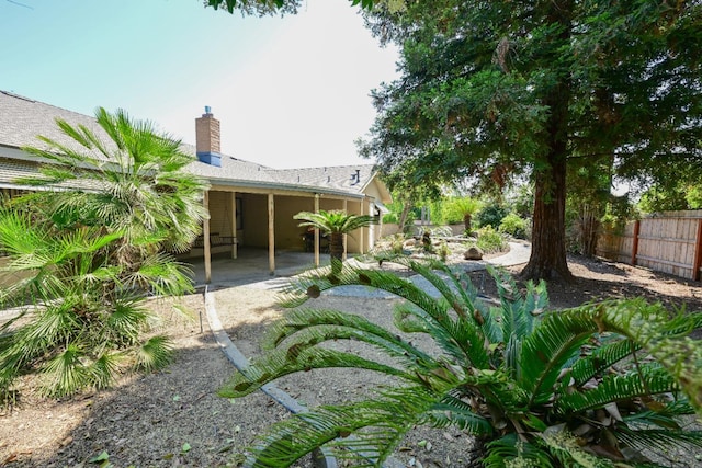 1911 W Simpson Ave, Fresno, CA 93705 - view of yard featuring a patio area