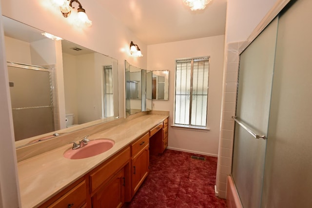 1911 W Simpson Ave, Fresno, CA 93705 - full bathroom with toilet, vanity, baseboards, and tile patterned floors