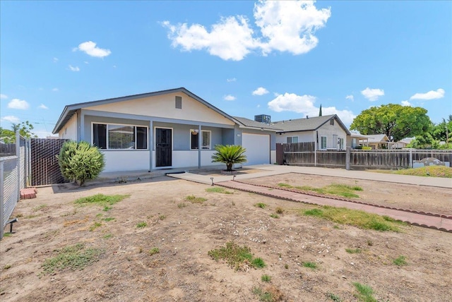 650 Tulare St, Parlier, CA 93648 - single story home with a garage, driveway, and stucco siding