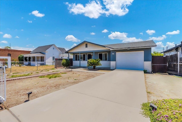 650 Tulare St, Parlier, CA 93648 - ranch-style house with stucco siding, concrete driveway, and a garage