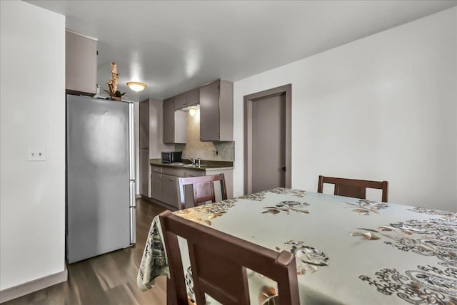 650 Tulare St, Parlier, CA 93648 - dining area with dark wood finished floors