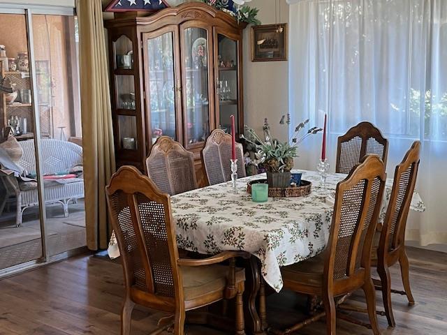 1173 Menlo Ave, Clovis, CA 93612 - dining room featuring wood finished floors and plenty of natural light