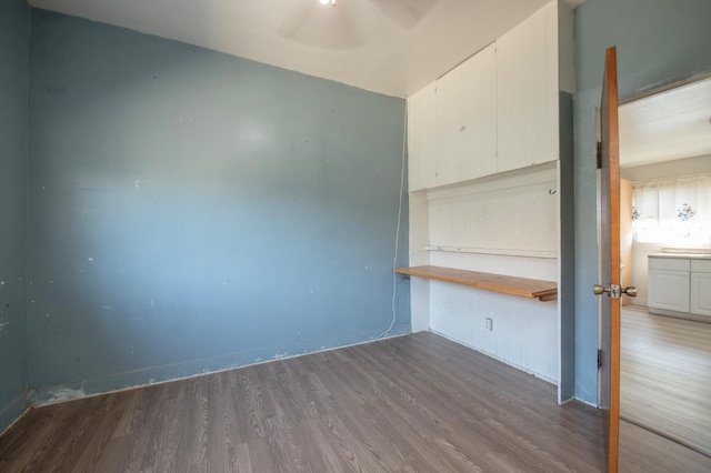 208 N 5th St, Fowler, CA 93625 - unfurnished living room featuring wood finished floors and a ceiling fan