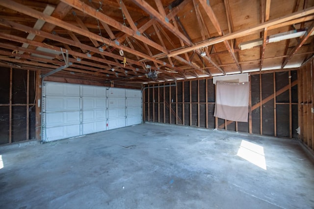 208 N 5th St, Fowler, CA 93625 - garage featuring a garage door opener