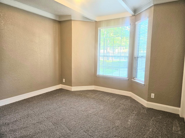 8147 N Cedar Ave Unit 115, Fresno, CA 93720 - empty room with a textured wall, carpet, baseboards, ornamental molding, and beam ceiling