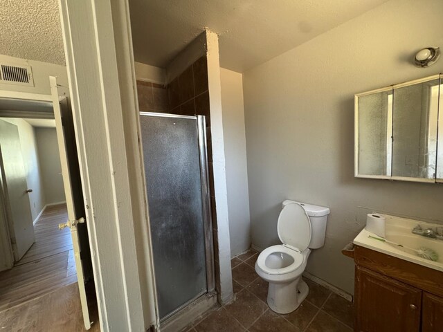 1546 W Orleans Ave, Fresno, CA 93706 - full bathroom featuring vanity, a stall shower, and tile patterned floors