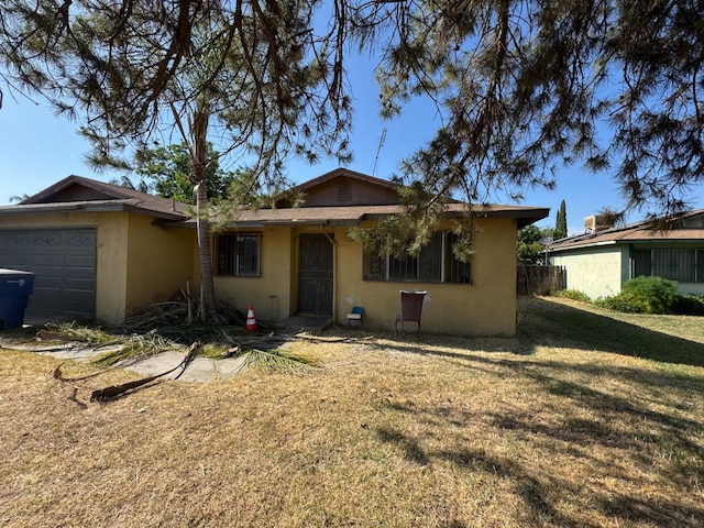 1546 W Orleans Ave, Fresno, CA 93706 - single story home with an attached garage and stucco siding