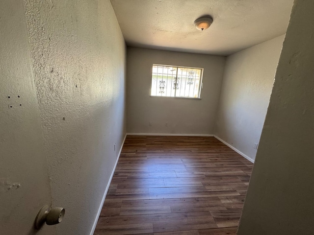 1546 W Orleans Ave, Fresno, CA 93706 - empty room featuring wood finished floors and a textured wall