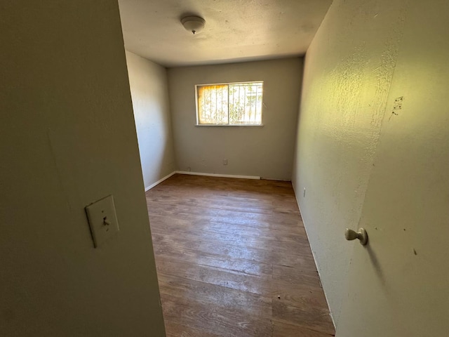 1546 W Orleans Ave, Fresno, CA 93706 - spare room featuring wood finished floors and baseboards