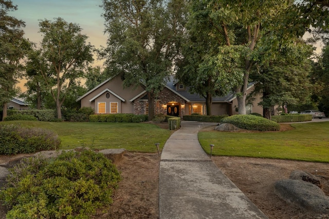 8741 E Los Altos Ave, Clovis, CA 93619 - view of front of home featuring a front yard