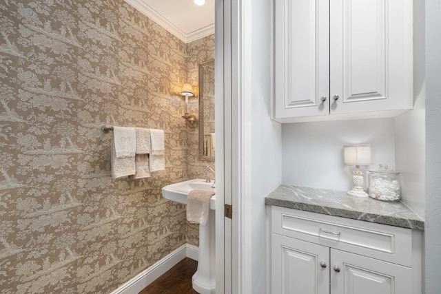 8741 E Los Altos Ave, Clovis, CA 93619 - bathroom with wood finished floors, baseboards, wallpapered walls, and ornamental molding