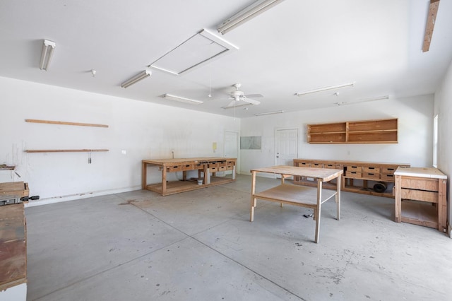8741 E Los Altos Ave, Clovis, CA 93619 - garage with a workshop area and ceiling fan