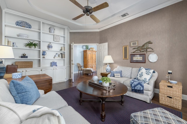 8741 E Los Altos Ave, Clovis, CA 93619 - living room featuring dark wood-style flooring, a ceiling fan, a raised ceiling, and baseboards