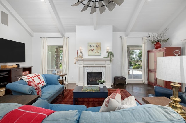 8741 E Los Altos Ave, Clovis, CA 93619 - living area with wood finished floors, a ceiling fan, a high end fireplace, and baseboards