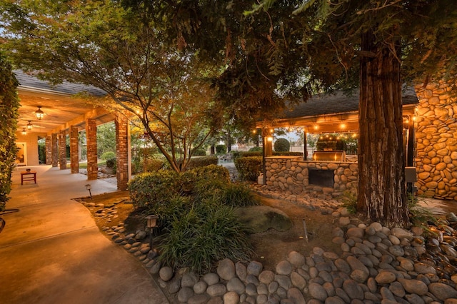 8741 E Los Altos Ave, Clovis, CA 93619 - view of yard with exterior kitchen, a patio, and ceiling fan