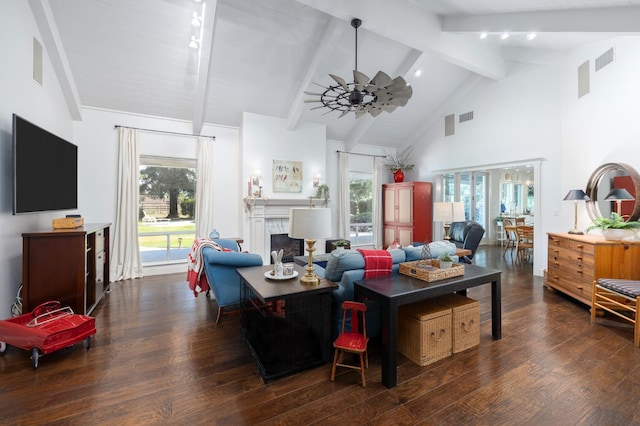 8741 E Los Altos Ave, Clovis, CA 93619 - living room featuring high vaulted ceiling, beamed ceiling, wood finished floors, a fireplace, and a ceiling fan