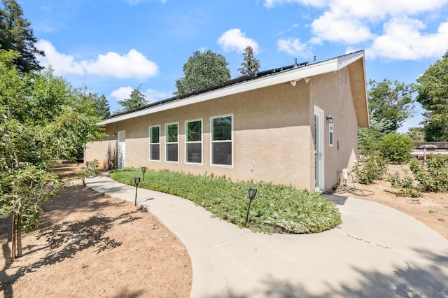 8741 E Los Altos Ave, Clovis, CA 93619 - view of property exterior with stucco siding