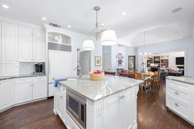 8741 E Los Altos Ave, Clovis, CA 93619 - kitchen featuring built in appliances, open shelves, open floor plan, white cabinetry, and recessed lighting