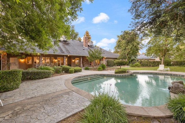 8741 E Los Altos Ave, Clovis, CA 93619 - swimming pool featuring a patio