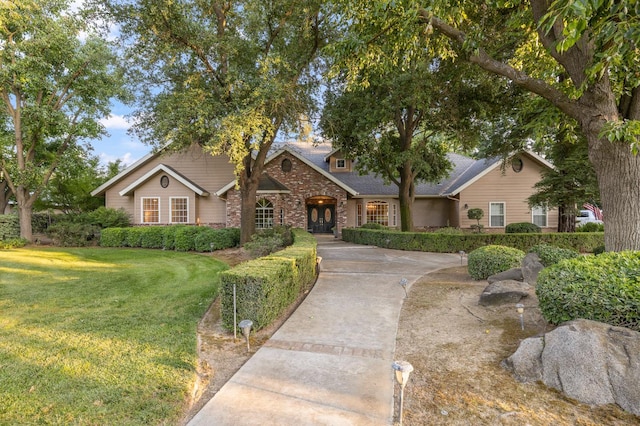 8741 E Los Altos Ave, Clovis, CA 93619 - view of front facade with a front yard, brick siding, and a shingled roof