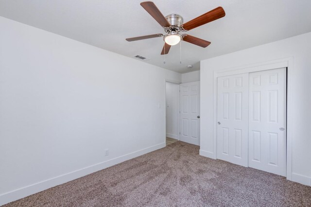 3722 N Hammel Way, Fresno, CA 93727 - unfurnished bedroom with carpet, baseboards, a closet, and ceiling fan