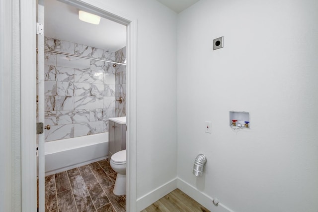 3722 N Hammel Way, Fresno, CA 93727 - bathroom with toilet, shower / bath combination, vanity, wood finished floors, and baseboards
