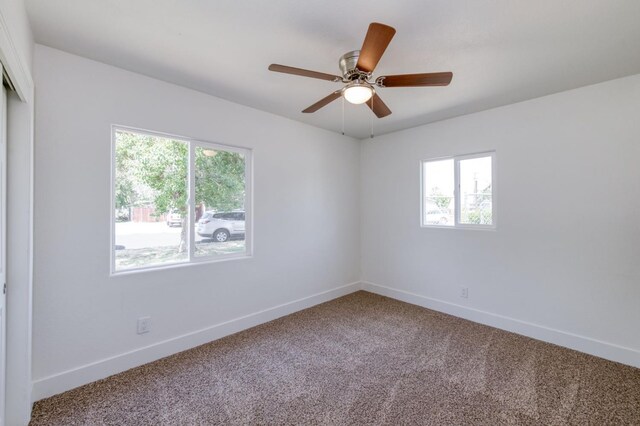 3722 N Hammel Way, Fresno, CA 93727 - carpeted empty room featuring healthy amount of natural light, baseboards, and a ceiling fan