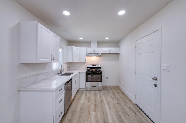 3722 N Hammel Way, Fresno, CA 93727 - kitchen featuring appliances with stainless steel finishes, a sink, under cabinet range hood, white cabinets, and recessed lighting