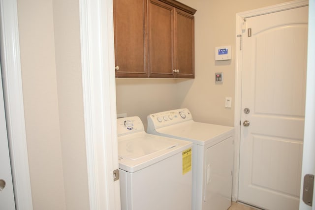 7285 W San Jose Ave, Fresno, CA 93723 - laundry room featuring washing machine and dryer and cabinet space
