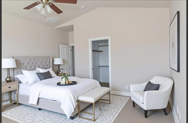 7285 W San Jose Ave, Fresno, CA 93723 - bedroom featuring vaulted ceiling, a closet, baseboards, ceiling fan, and a walk in closet