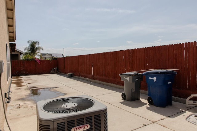 7285 W San Jose Ave, Fresno, CA 93723 - fenced backyard with central air condition unit and a patio