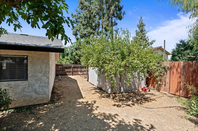 772 W Menlo Ave, Clovis, CA 93612 - fenced backyard featuring an outdoor structure