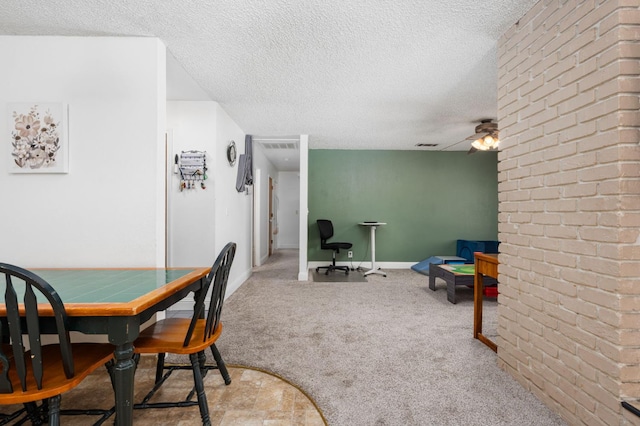 772 W Menlo Ave, Clovis, CA 93612 - carpeted dining area with a textured ceiling, ceiling fan, and baseboards