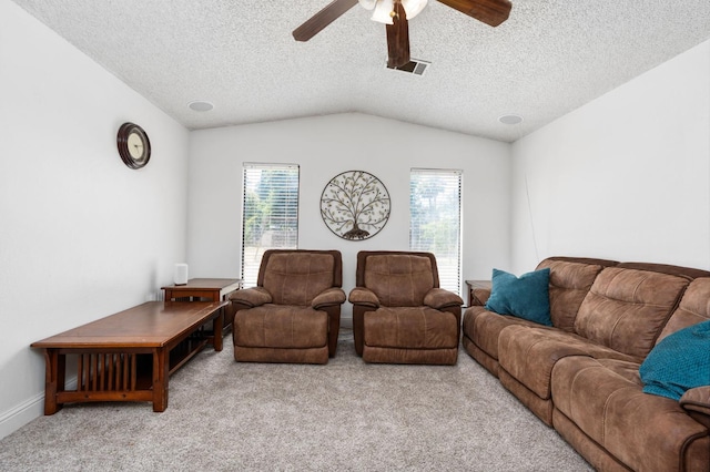 772 W Menlo Ave, Clovis, CA 93612 - living room with vaulted ceiling, carpet floors, a ceiling fan, and a textured ceiling