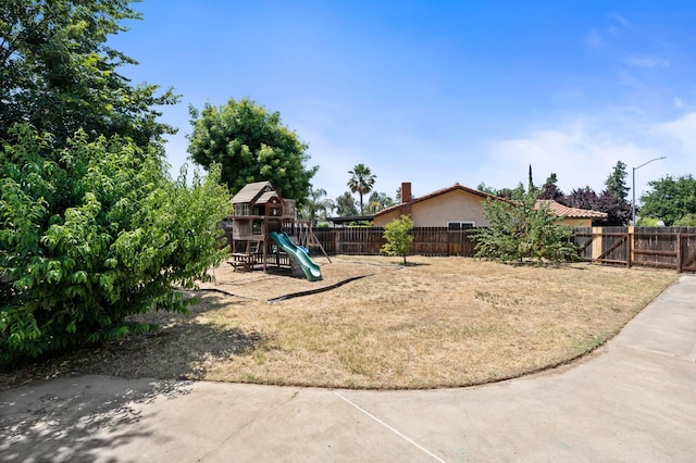 772 W Menlo Ave, Clovis, CA 93612 - view of yard with a playground