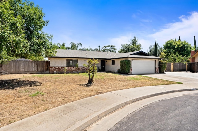 772 W Menlo Ave, Clovis, CA 93612 - single story home featuring an attached garage, driveway, and brick siding