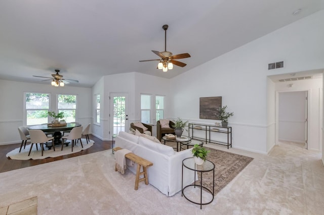 770 N Cherry Ln, Clovis, CA 93611 - carpeted living area with ceiling fan, baseboards, and high vaulted ceiling