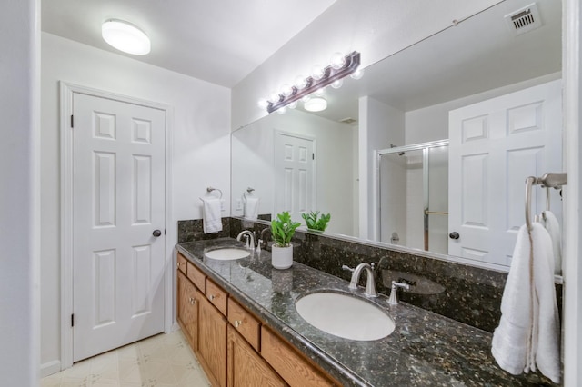 770 N Cherry Ln, Clovis, CA 93611 - bathroom featuring double vanity and a shower stall