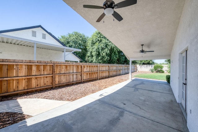 770 N Cherry Ln, Clovis, CA 93611 - fenced backyard with ceiling fan and a patio