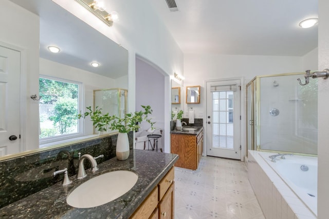 770 N Cherry Ln, Clovis, CA 93611 - bathroom featuring a shower stall, two vanities, a garden tub, and tile patterned floors
