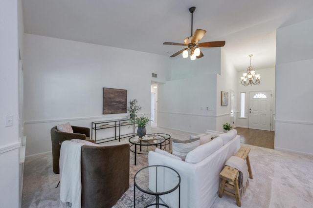 770 N Cherry Ln, Clovis, CA 93611 - living room with a chandelier, carpet flooring, ceiling fan, high vaulted ceiling, and baseboards