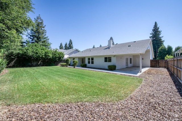 770 N Cherry Ln, Clovis, CA 93611 - back of property featuring a patio, a chimney, and stucco siding