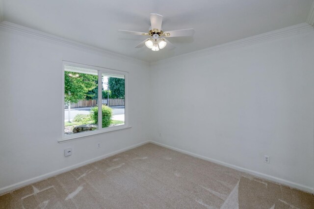 770 N Cherry Ln, Clovis, CA 93611 - empty room with light carpet, ornamental molding, baseboards, and a ceiling fan
