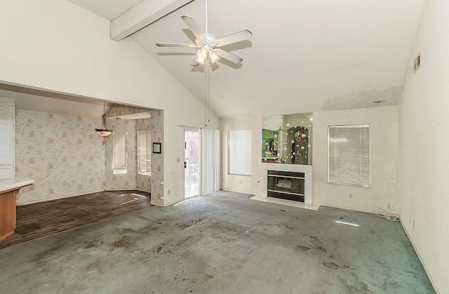 7543 N Spalding Ave, Fresno, CA 93720 - unfurnished living room featuring beamed ceiling, ceiling fan, a tiled fireplace, high vaulted ceiling, and baseboards