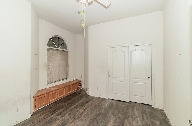 7543 N Spalding Ave, Fresno, CA 93720 - unfurnished room with dark wood finished floors, ceiling fan, and baseboards
