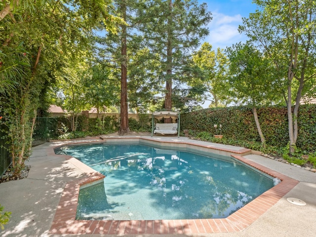 811 E Country View Cir, Fresno, CA 93730 - view of swimming pool with a fenced backyard