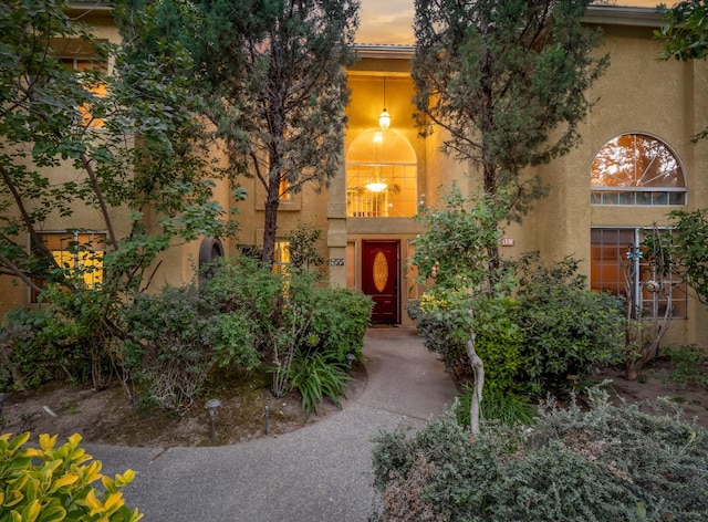 811 E Country View Cir, Fresno, CA 93730 - entrance to property featuring stucco siding