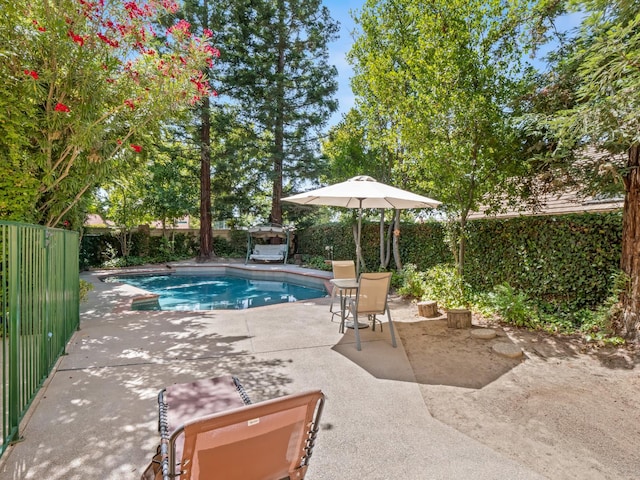 811 E Country View Cir, Fresno, CA 93730 - view of swimming pool featuring a patio area and a fenced backyard